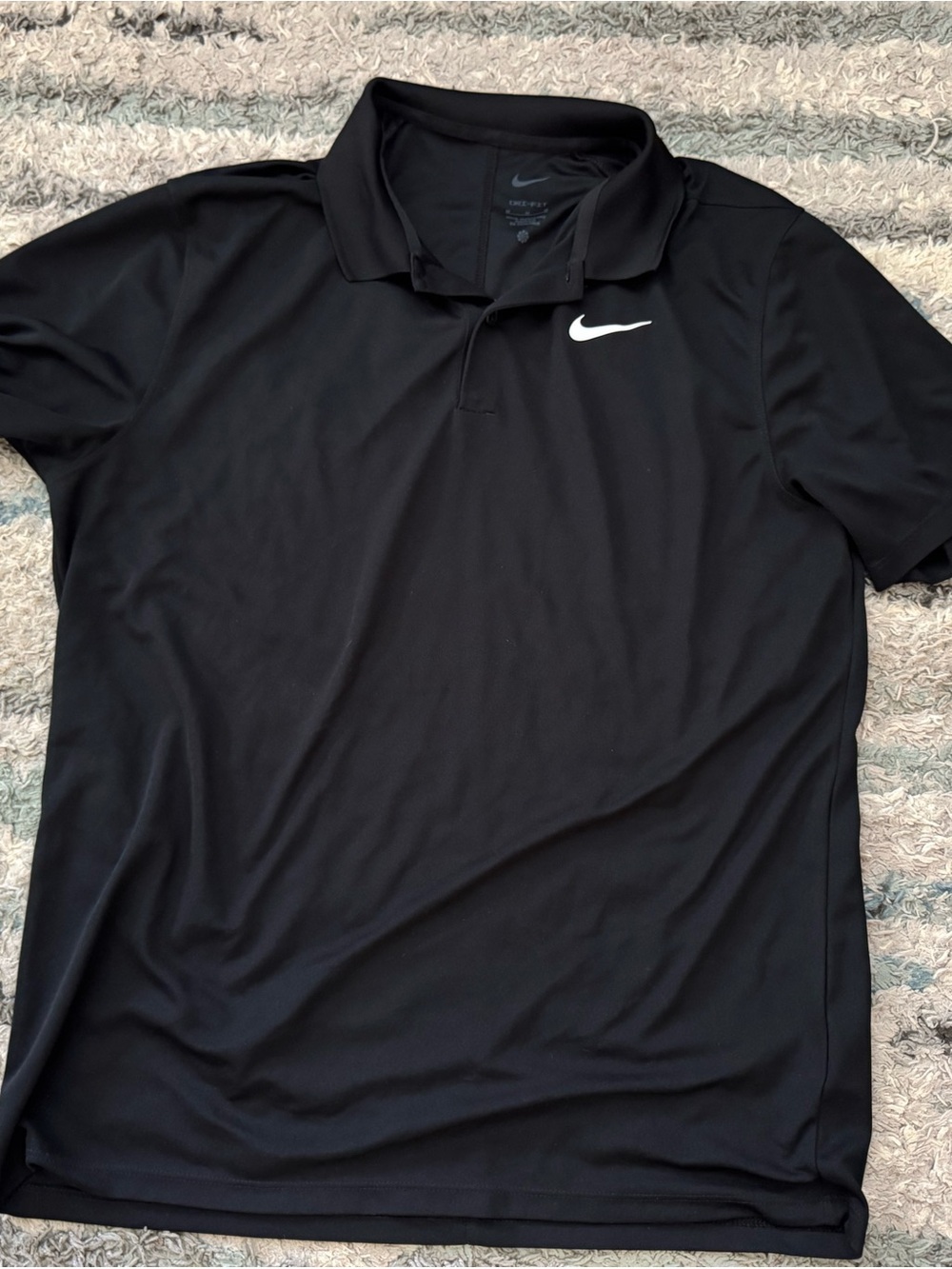 Nike Black Polo Shirt with White Swoosh